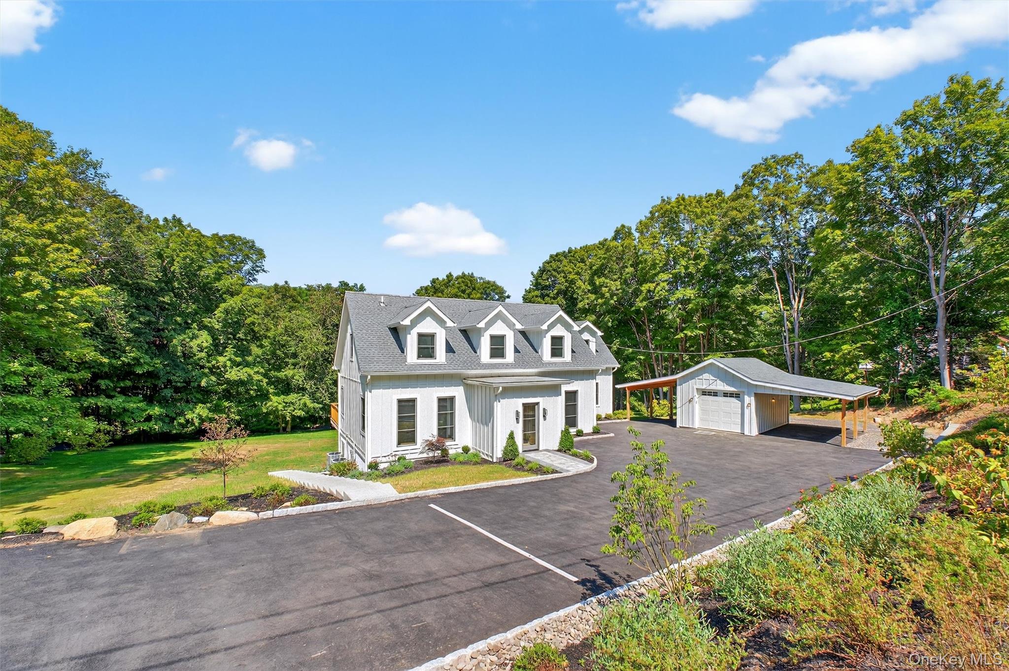 64 Stonehouse Road Somers, NY 10589 - Photo 3 of 48 a front view of a house with a yard