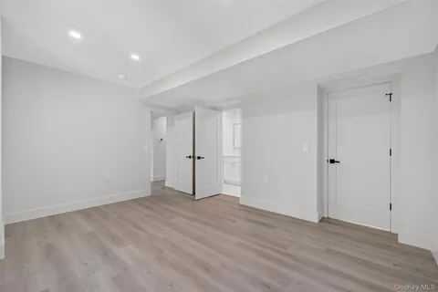 a view of balcony with wooden floor