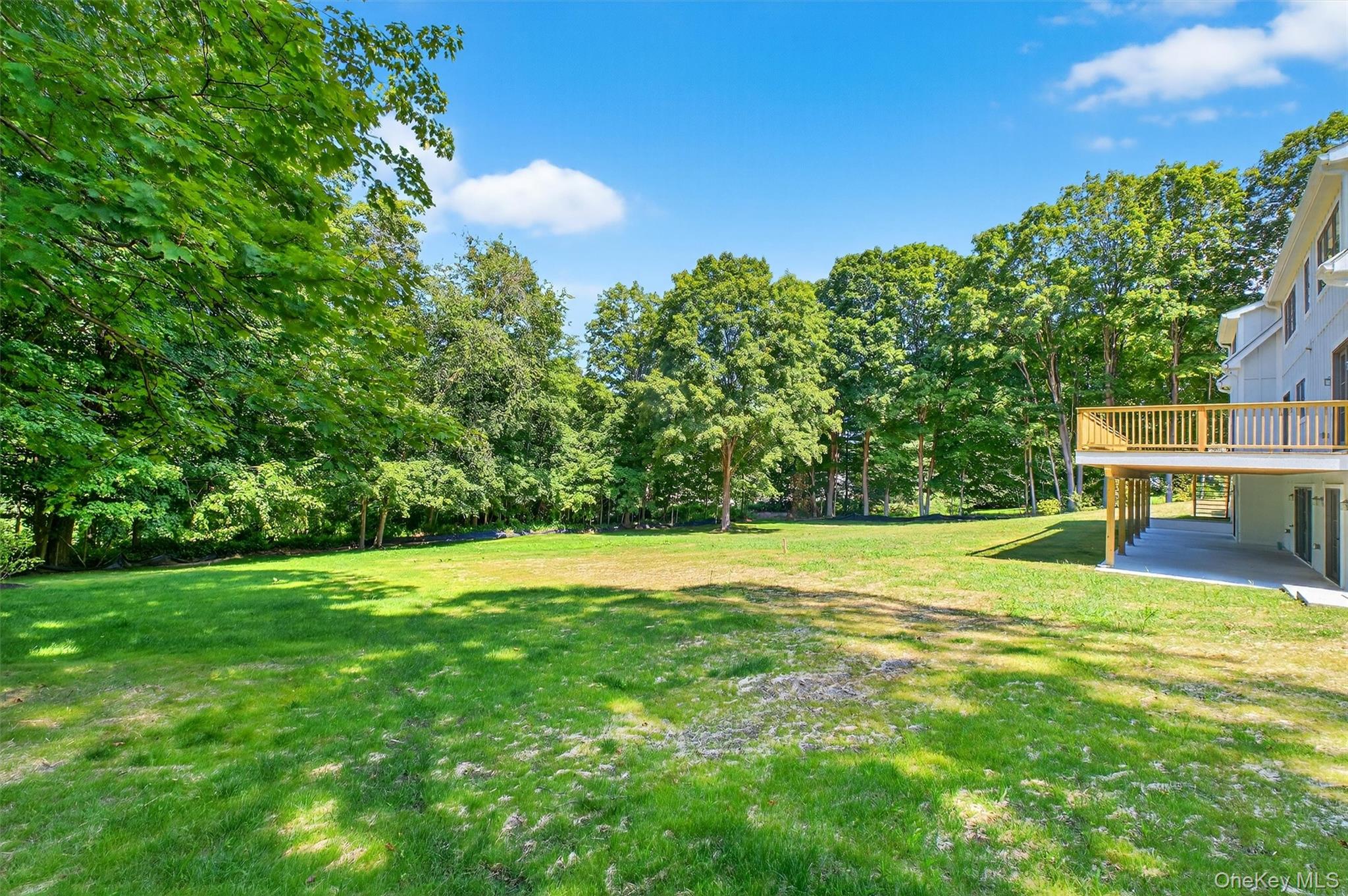 64 Stonehouse Road Somers, NY 10589 - Photo 46 of 48 a view of a big yard with an trees