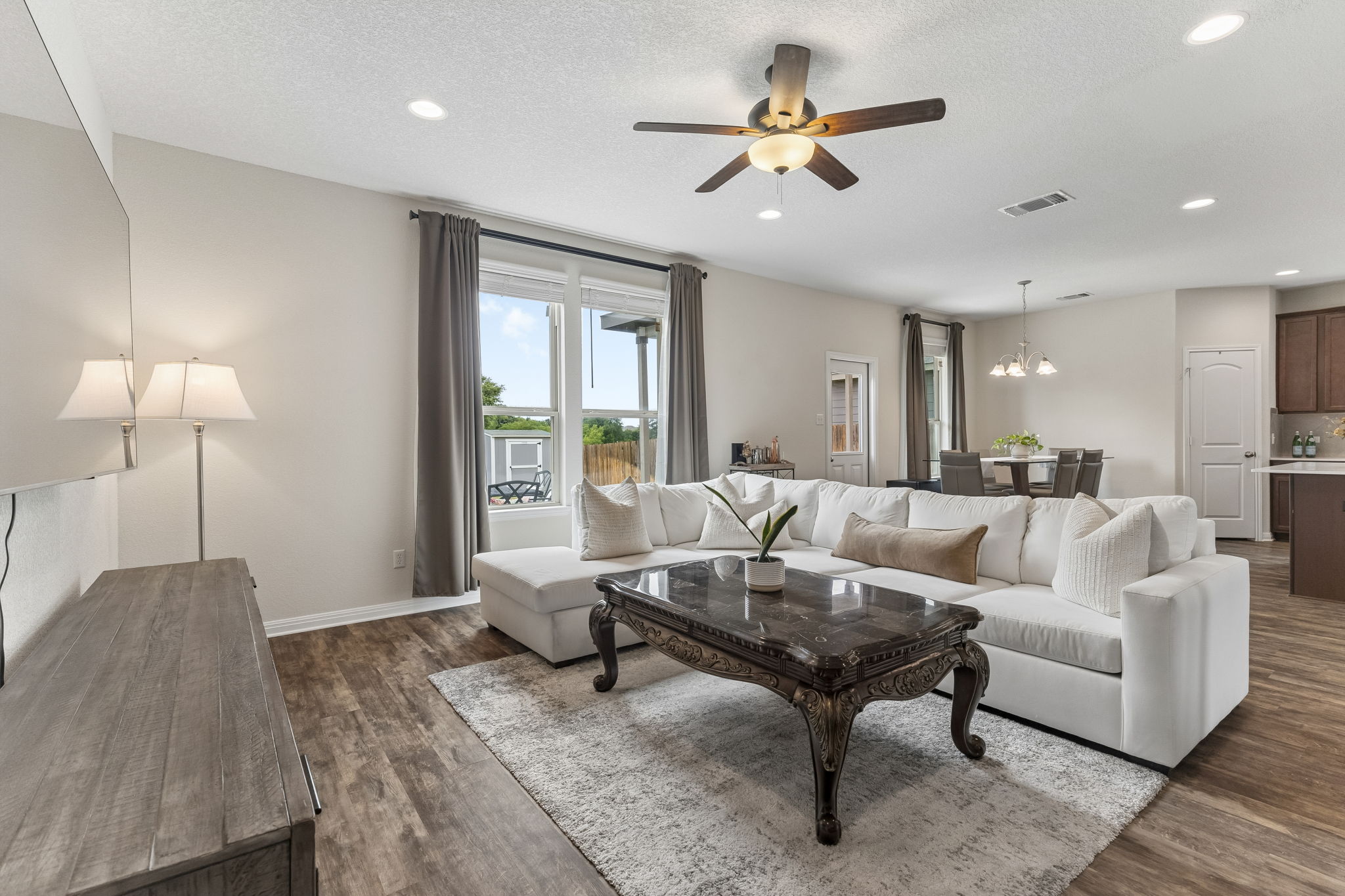 809 Whitman Avenue Georgetown, TX 78626 - Photo 11 of 35 a living room with furniture and a large window