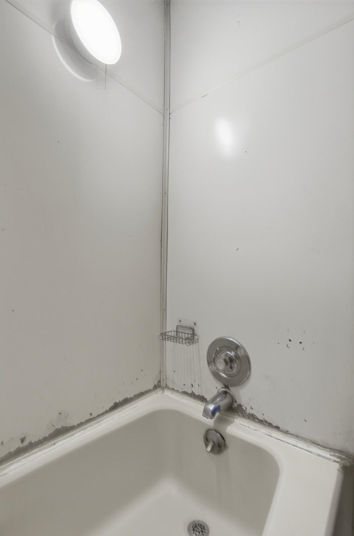 910 18th Avenue Rock Island, IL 61201 - Photo 15 of 30 a bathroom with a sink