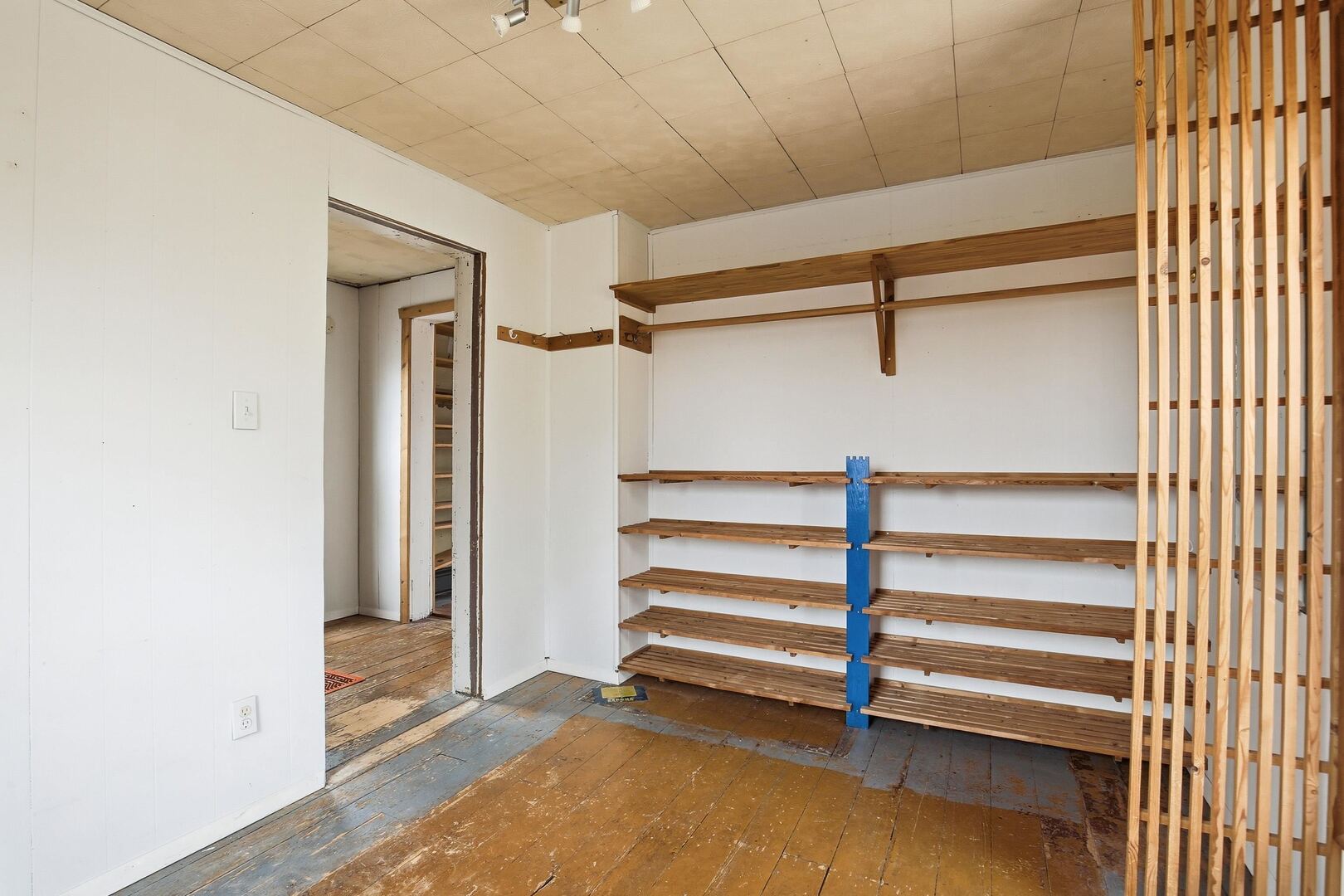 910 18th Avenue Rock Island, IL 61201 - Photo 24 of 30 a view of walk in closet with empty racks