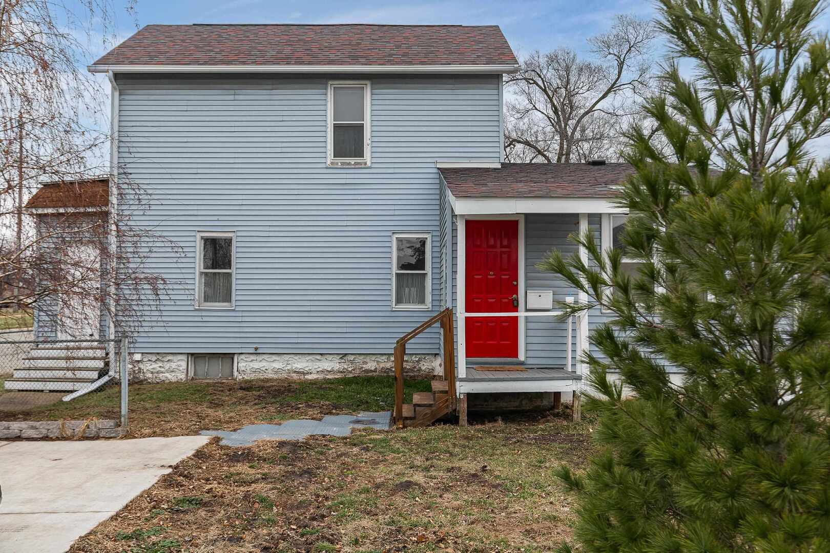 910 18th Avenue Rock Island, IL 61201 - Photo 29 of 30 a house that has a tree in front of the house