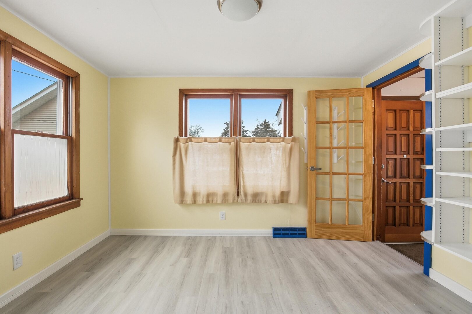 910 18th Avenue Rock Island, IL 61201 - Photo 6 of 30 an empty room with windows and closet