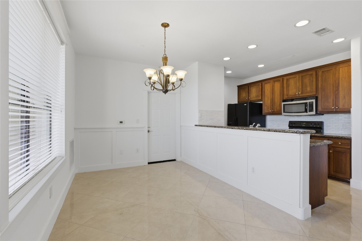 17700 Edgewood Way, Unit 101 Jonestown, TX 78645 - Photo 12 of 40 Access to garage