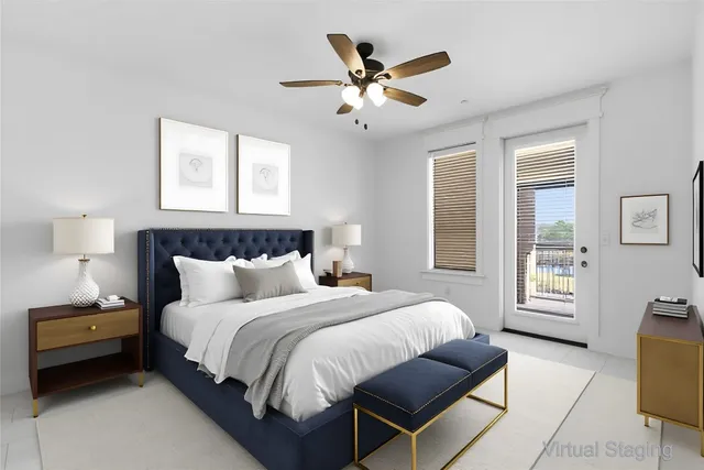 a bedroom with bed and window