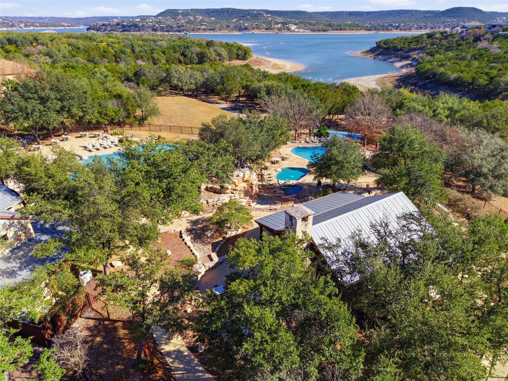 17700 Edgewood Way, Unit 101 Jonestown, TX 78645 - Photo 32 of 40 an aerial view of a houses with a yard