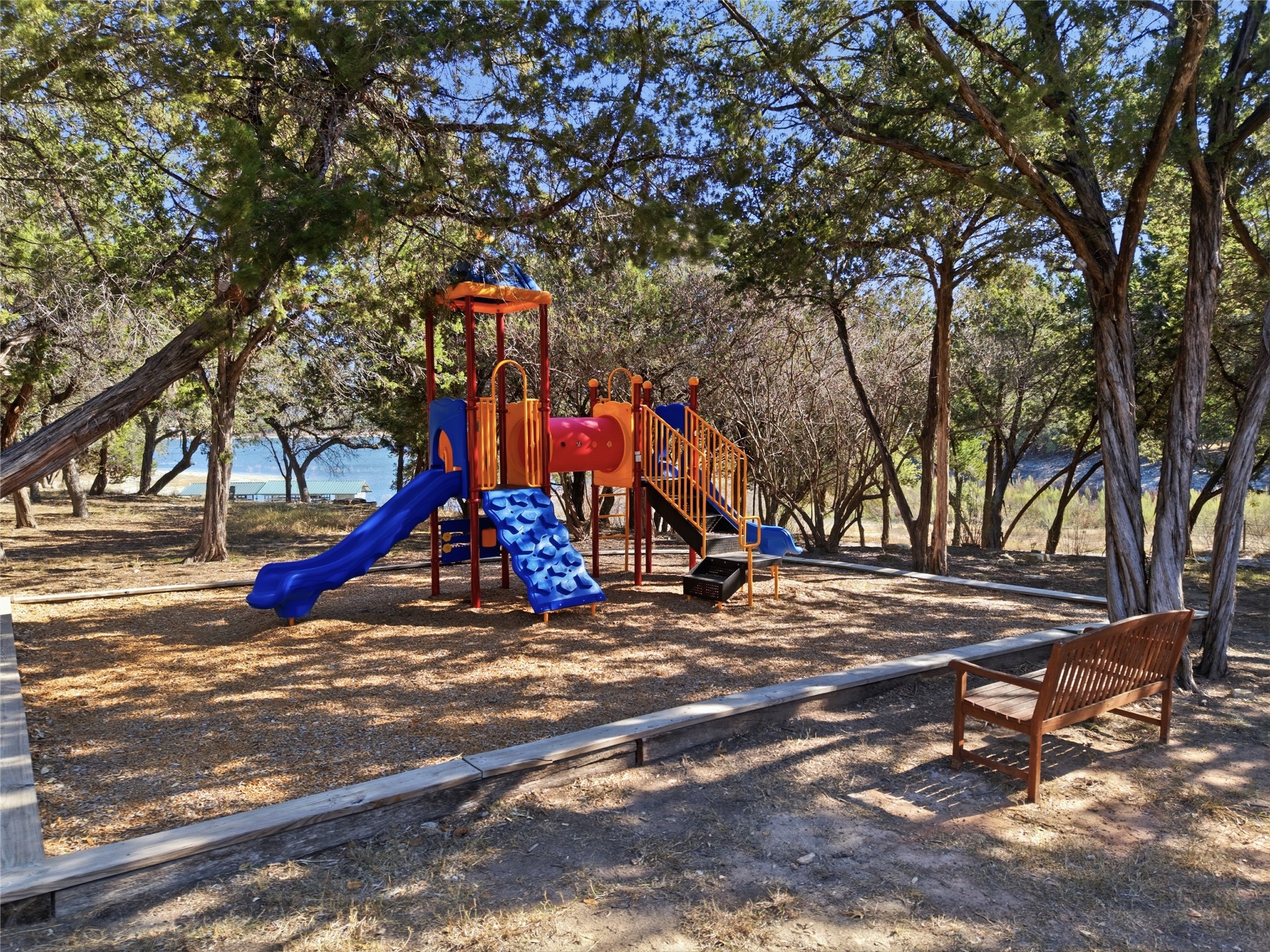 17700 Edgewood Way, Unit 101 Jonestown, TX 78645 - Photo 39 of 40 a view of outdoor space with garden and entertaining space