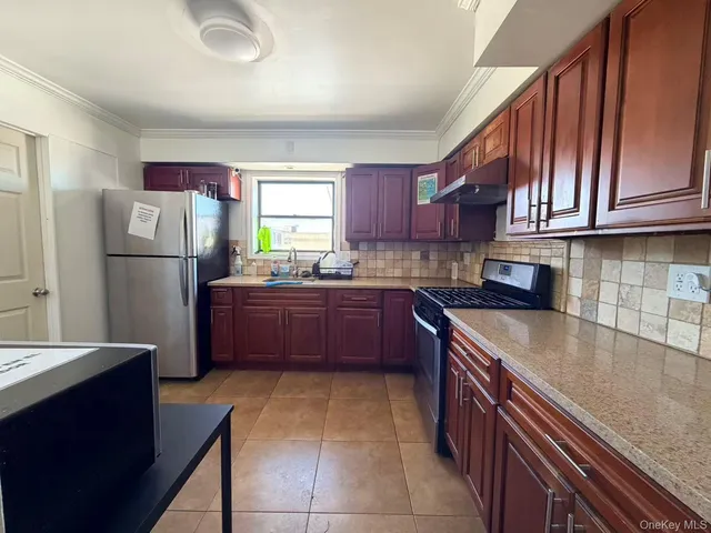 $1,638,000 | 59-07 59th Drive | Maspeth