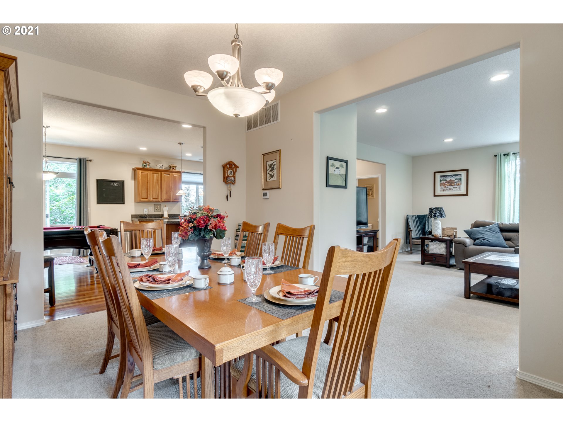 295 South Hillhurst Road Ridgefield, WA 98642 - Photo 5 of 32 a view of a dining room with furniture
