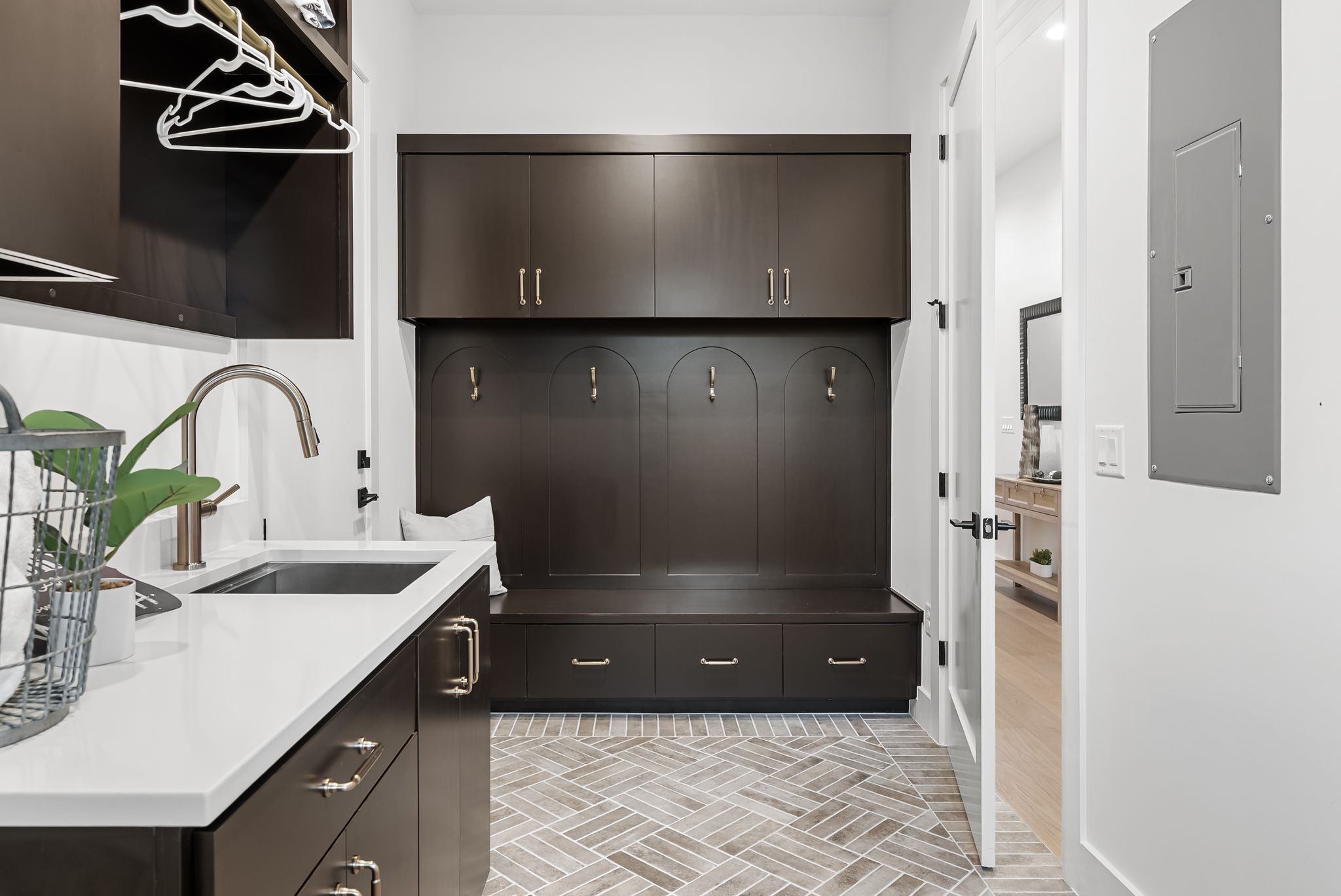 1607 Rabb Road Austin, TX 78704 - Photo 31 of 40 Mudroom featuring a sink and electric panel