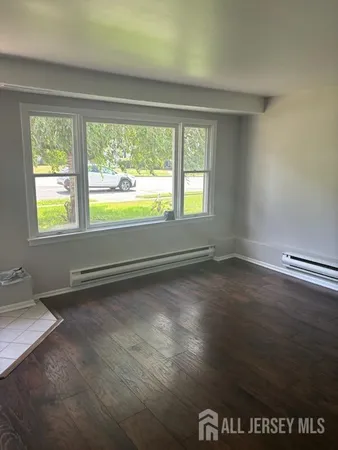 a view of a room that has a window