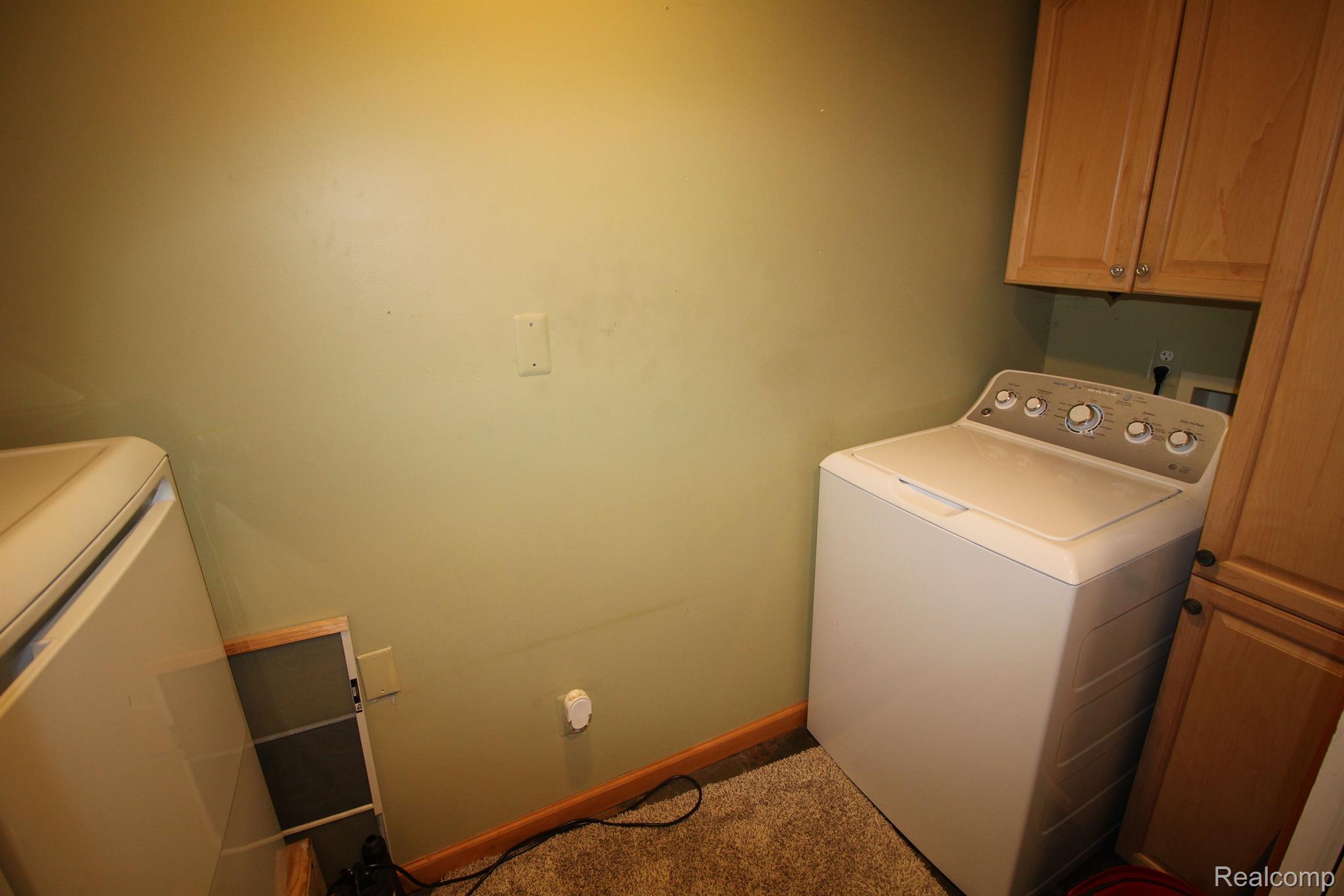 1228 Elliott Road Fowlerville, MI 48836 - Photo 34 of 47 First floor laundry