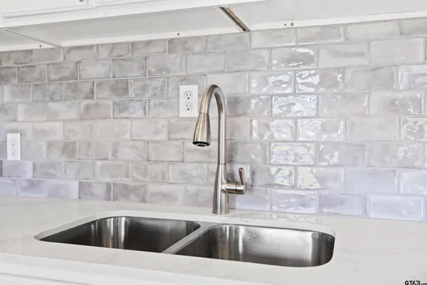 a view of a sink and tap