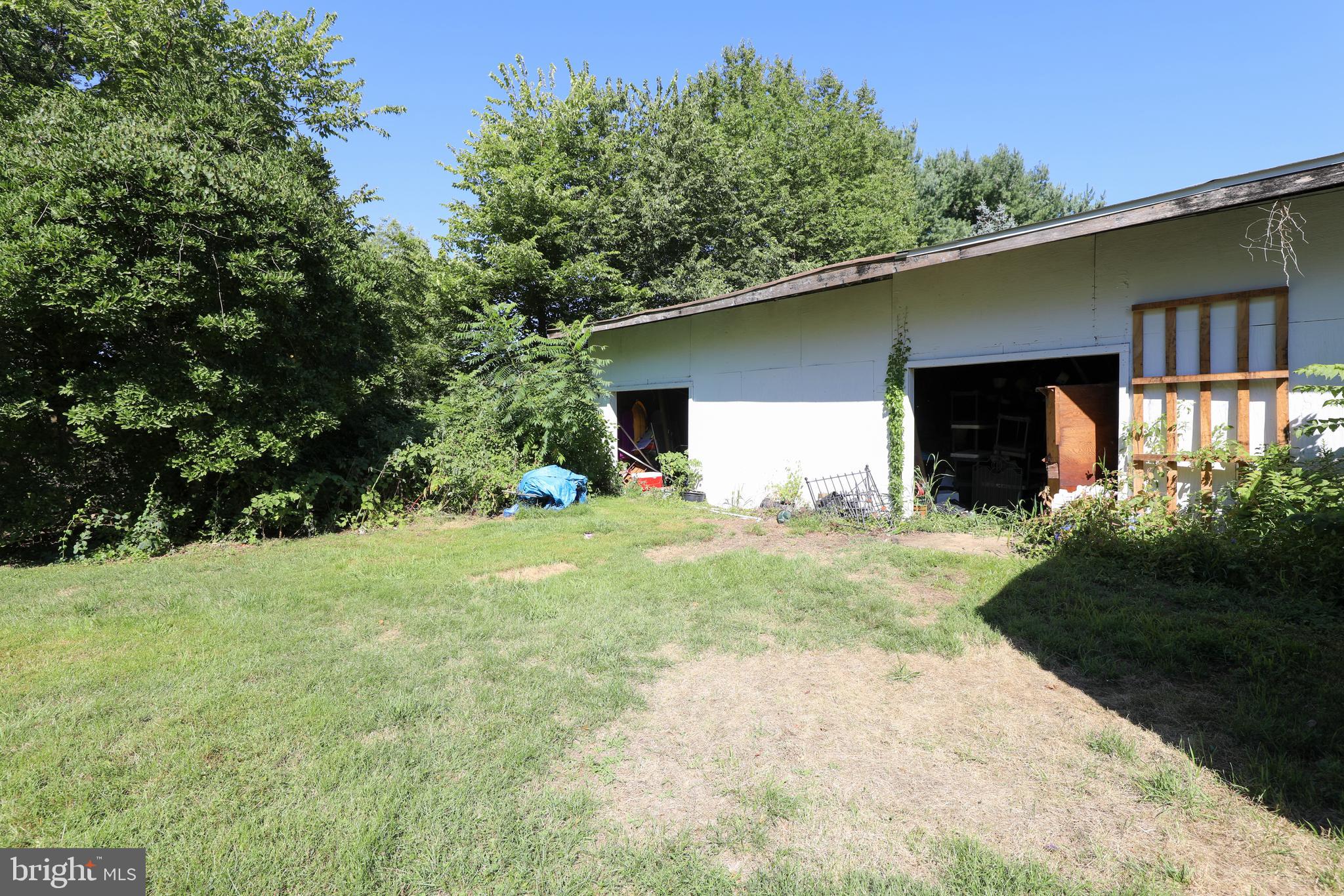1297 Lindenhurst Road Newtown, PA 18940 - Photo 22 of 38 2 more garage bays in distress condition