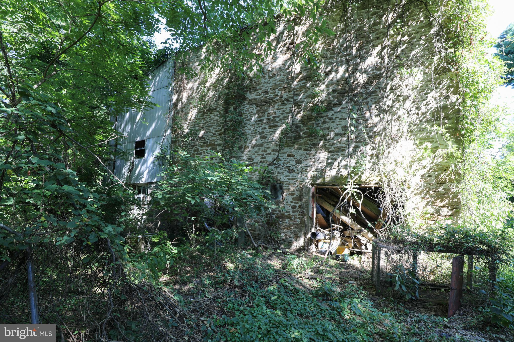 1297 Lindenhurst Road Newtown, PA 18940 - Photo 30 of 38 Stone Barn in distress