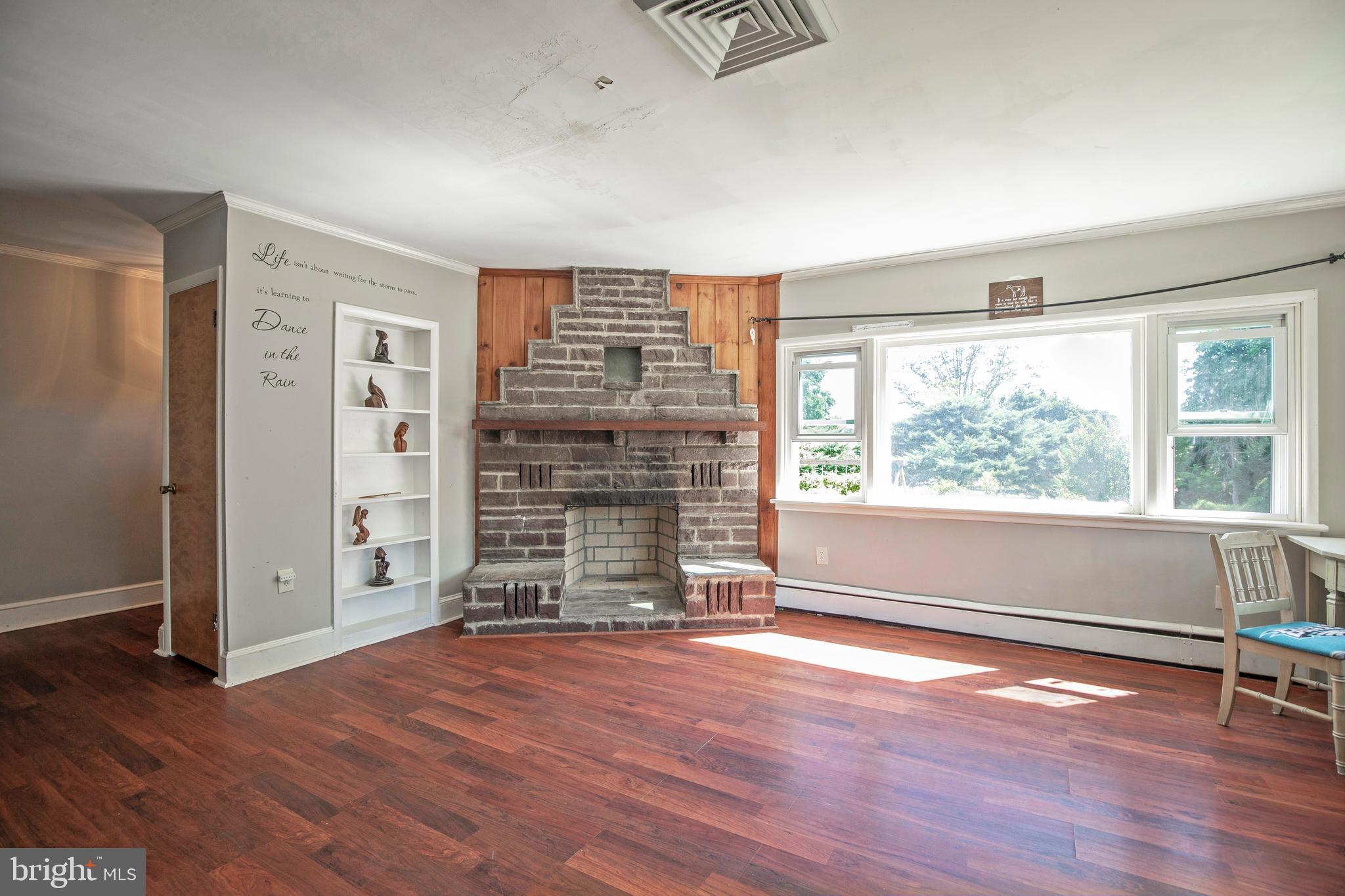 1297 Lindenhurst Road Newtown, PA 18940 - Photo 7 of 38 Family room with fireplace Main level