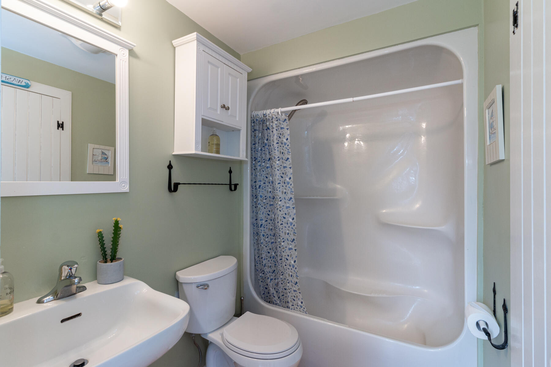 15 Brant Rock Road, Unit 765 Mashpee, MA 02649 - Photo 13 of 17 a bathroom with a sink toilet and shower