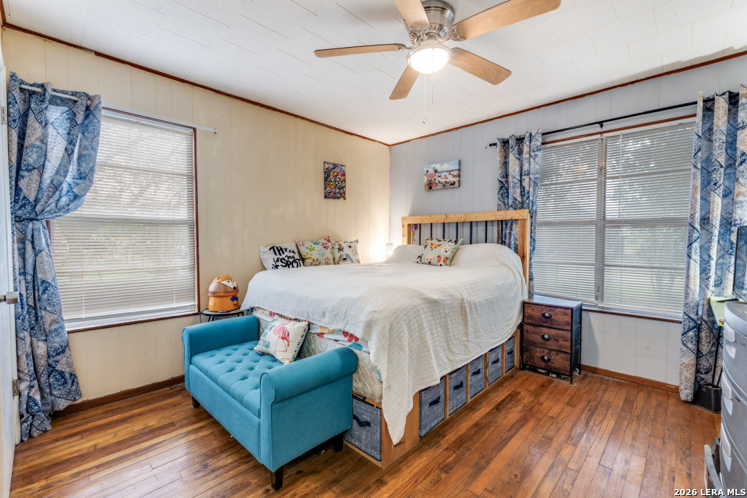 914 6th Street Blanco, TX 78606 - Photo 14 of 26 a bed room with a bed and a window