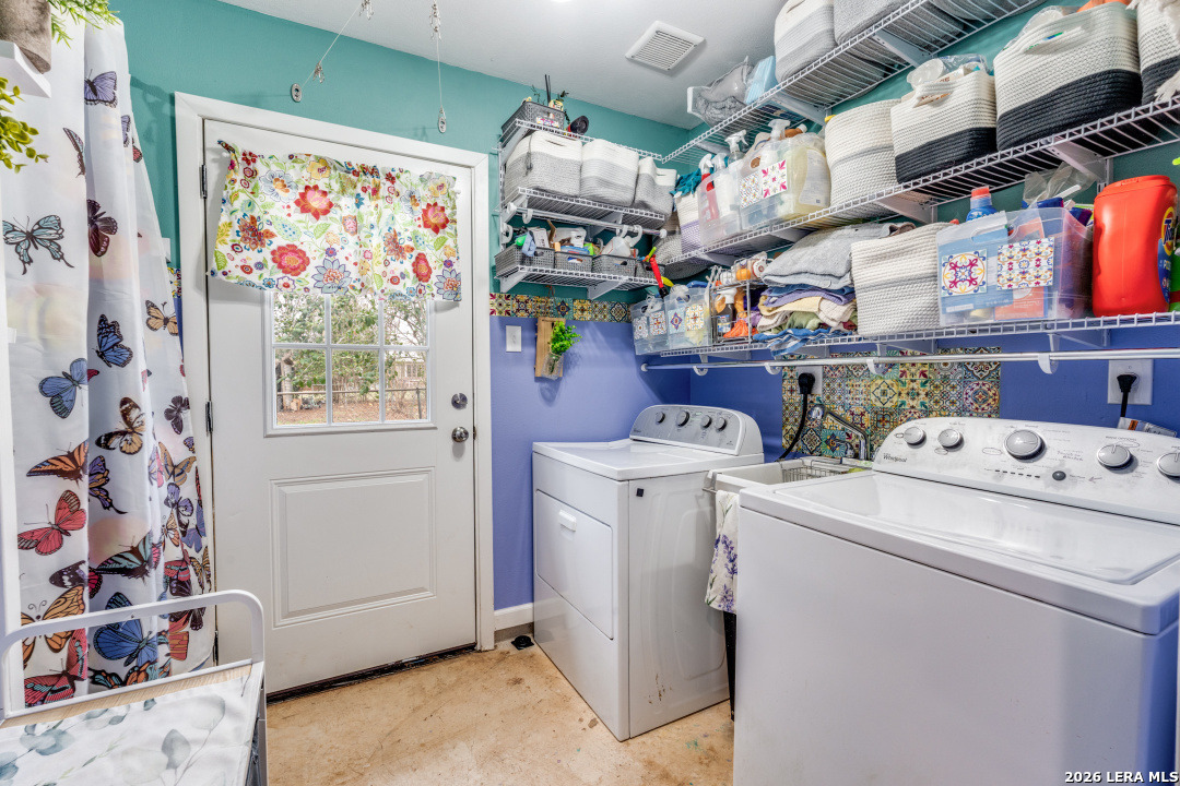 914 6th Street Blanco, TX 78606 - Photo 20 of 26 a utility room with dryer and washer
