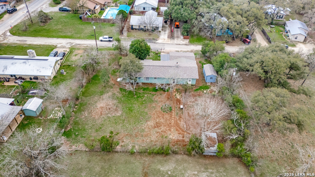 914 6th Street Blanco, TX 78606 - Photo 23 of 26 an aerial view of a house with a yard and lake view
