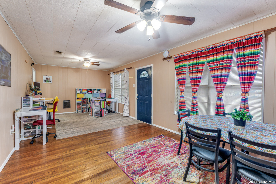 914 6th Street Blanco, TX 78606 - Photo 7 of 26 a living room with furniture and a wooden floor