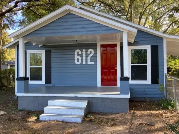 a front view of a house with porch