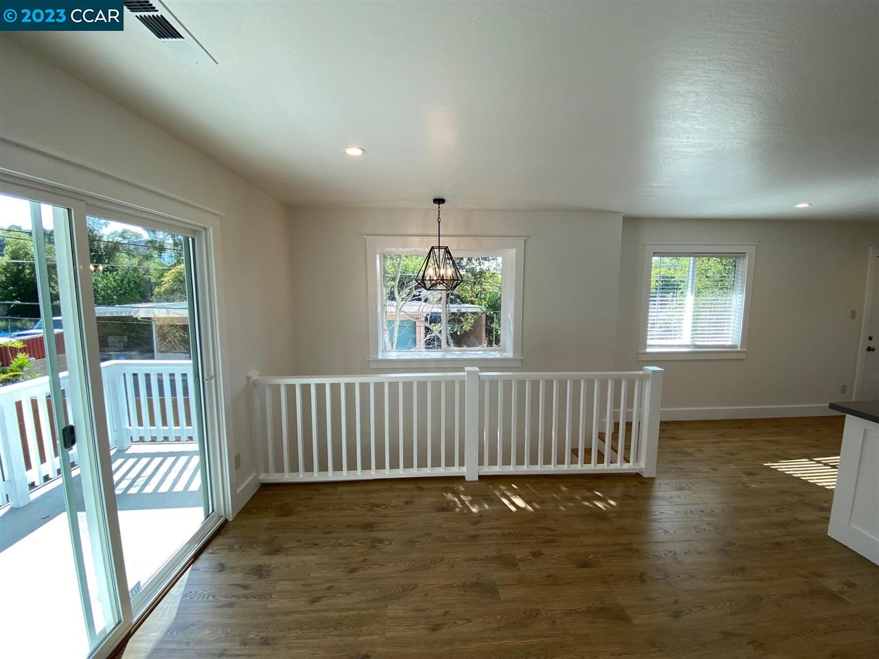 4882 San Pablo Dam Road, Unit B El Sobrante, CA 94803 - Photo 5 of 12 a view of livingroom with furniture wooden floor and window