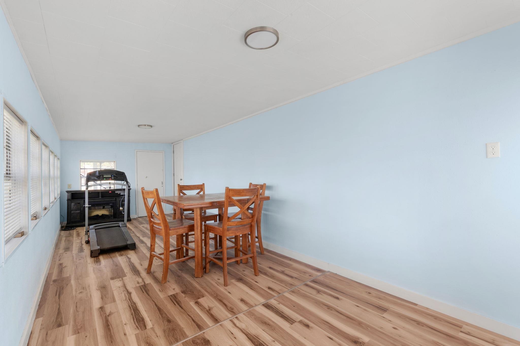 1365 Norma Tow, TX 78672 - Photo 33 of 45 a dining room with furniture and wooden floor