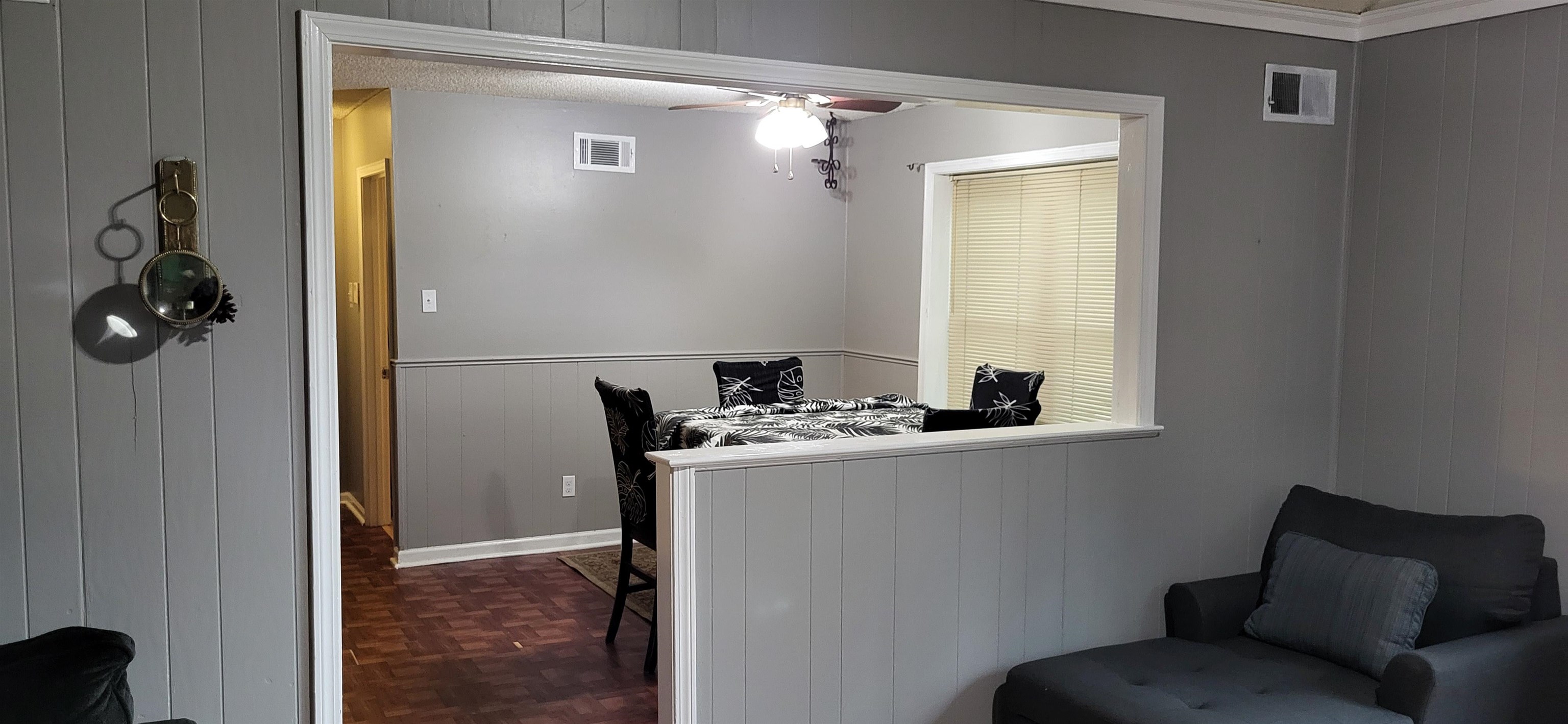 4567 Crump Road Memphis, TN 38141 - Photo 10 of 28 a living room with furniture and a mirror