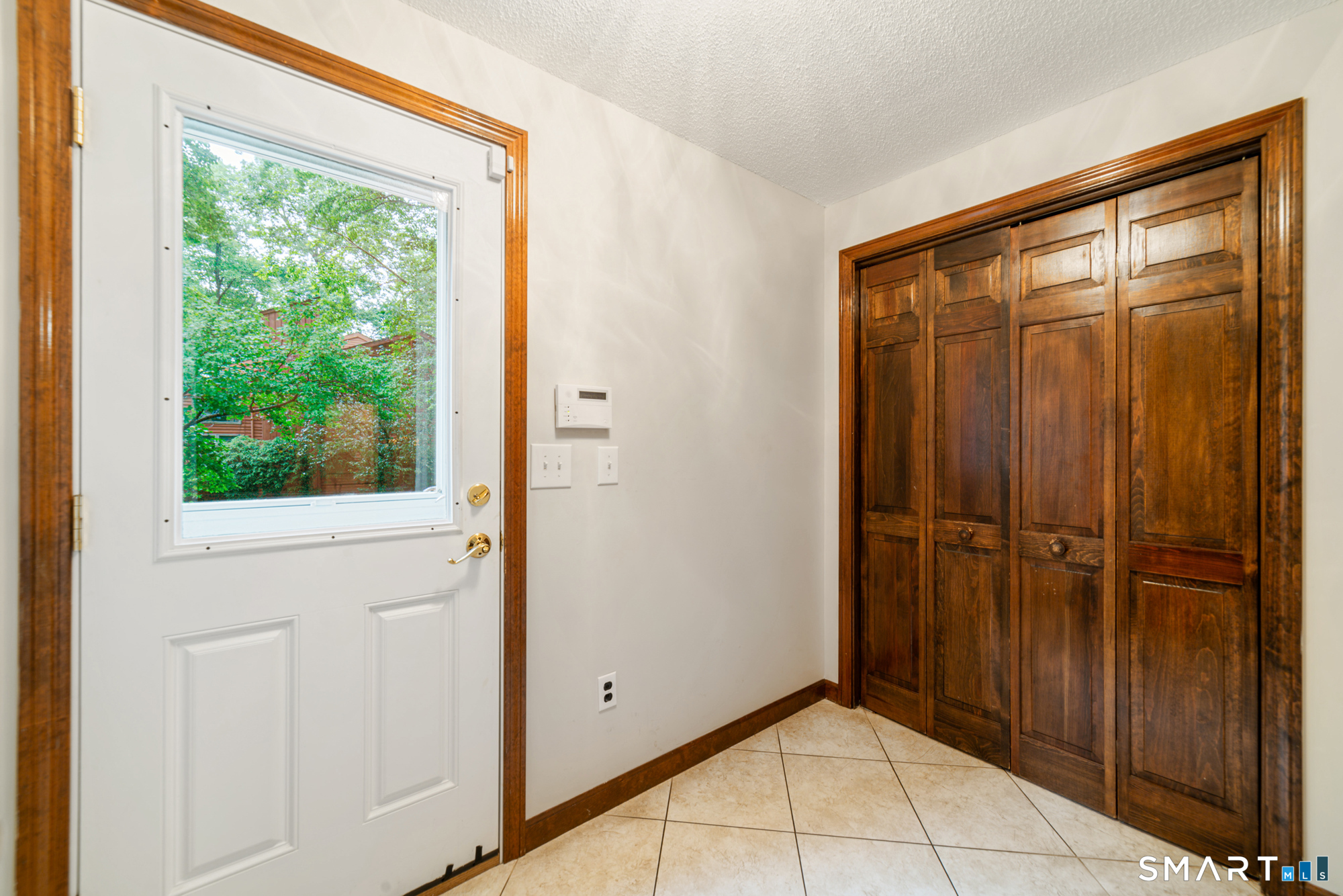 548 Beecher Road Wolcott, CT 06716 - Photo 15 of 36 Side entrance leading into Kitchen