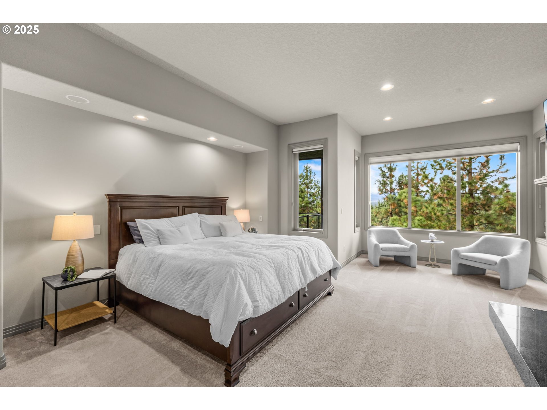 3155 Northwest Metke Place Bend, OR 97703 - Photo 18 of 28 a bedroom with a bed and large window