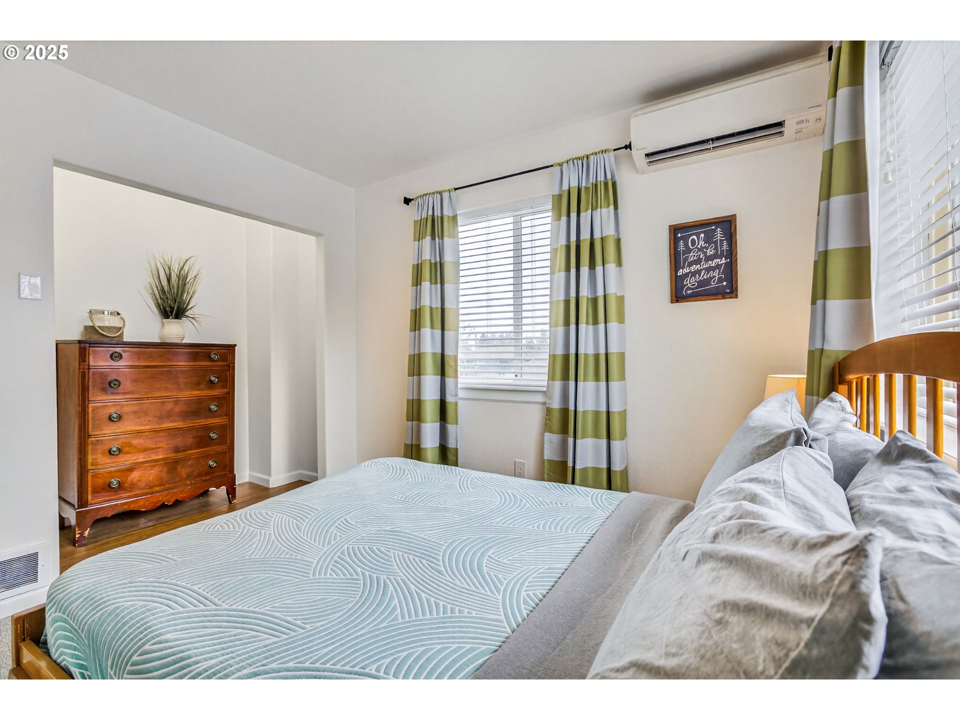3155 Northwest Metke Place Bend, OR 97703 - Photo 25 of 28 a bedroom with a bed and a dresser