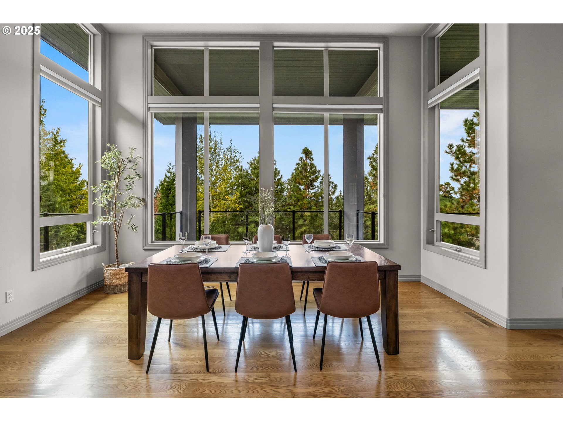 3155 Northwest Metke Place Bend, OR 97703 - Photo 27 of 28 a view of a dining room with furniture window and wooden floor