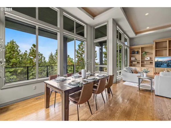 a view of a dining room with furniture window and outside view