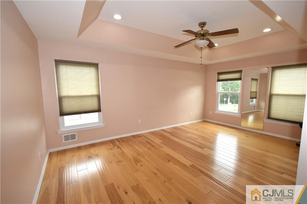 1 Timber Ridge Road North Brunswick, NJ 08902 - Photo 18 of 38 a view of an empty room and window