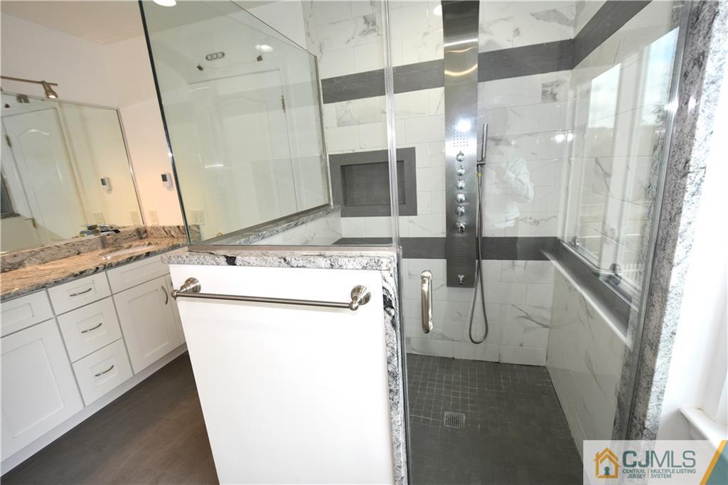 1 Timber Ridge Road North Brunswick, NJ 08902 - Photo 21 of 38 a utility room with dryer and washer