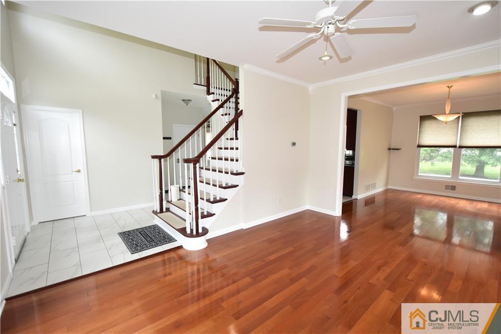 1 Timber Ridge Road North Brunswick, NJ 08902 - Photo 3 of 38 a view of entryway with wooden floor