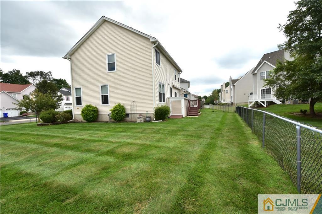 1 Timber Ridge Road North Brunswick, NJ 08902 - Photo 38 of 38 a view of a house with a yard