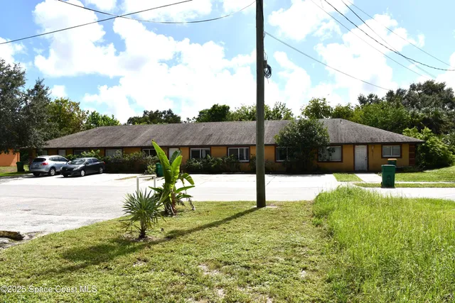 a house view with a garden space