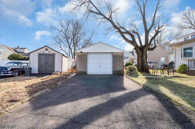 a view of a house with a yard porch and sitting area