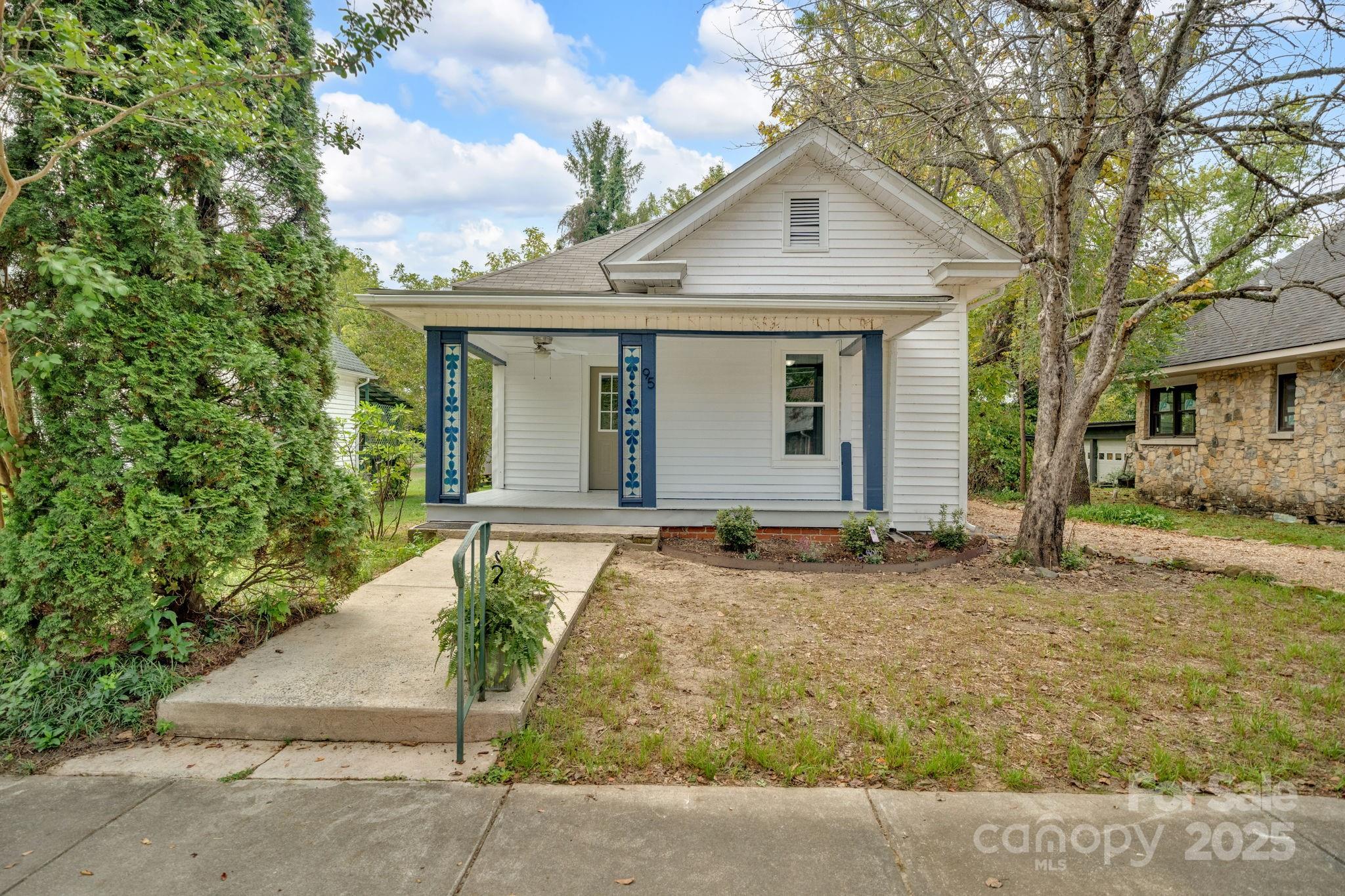 95 Whitmire Street Brevard, NC 28712 - Photo 1 of 34 front view of a house with a yard
