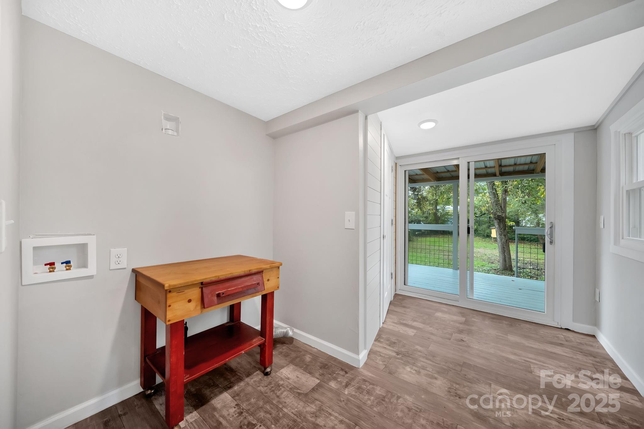 95 Whitmire Street Brevard, NC 28712 - Photo 23 of 34 a room with furniture and a window