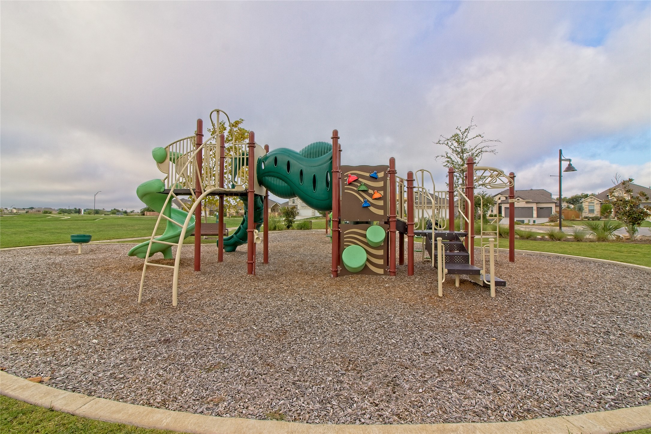 555 White Steppe Way Georgetown, TX 78626 - Photo 32 of 40 a view of a park with swings