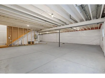 a view of a house with dining room and wooden fence