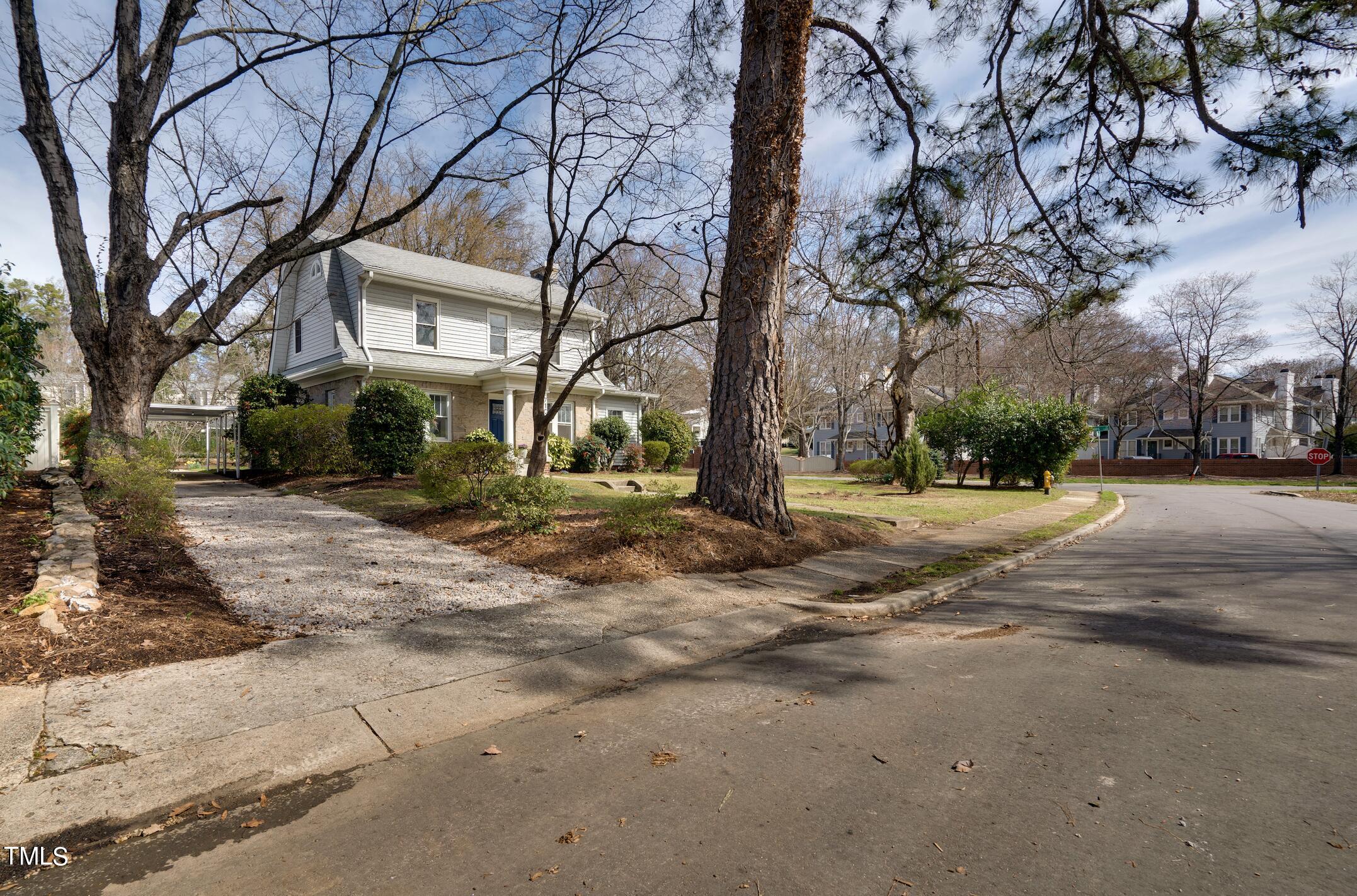 710 Nash Drive Raleigh, NC 27608 - Photo 5 of 36 a view of road with trees