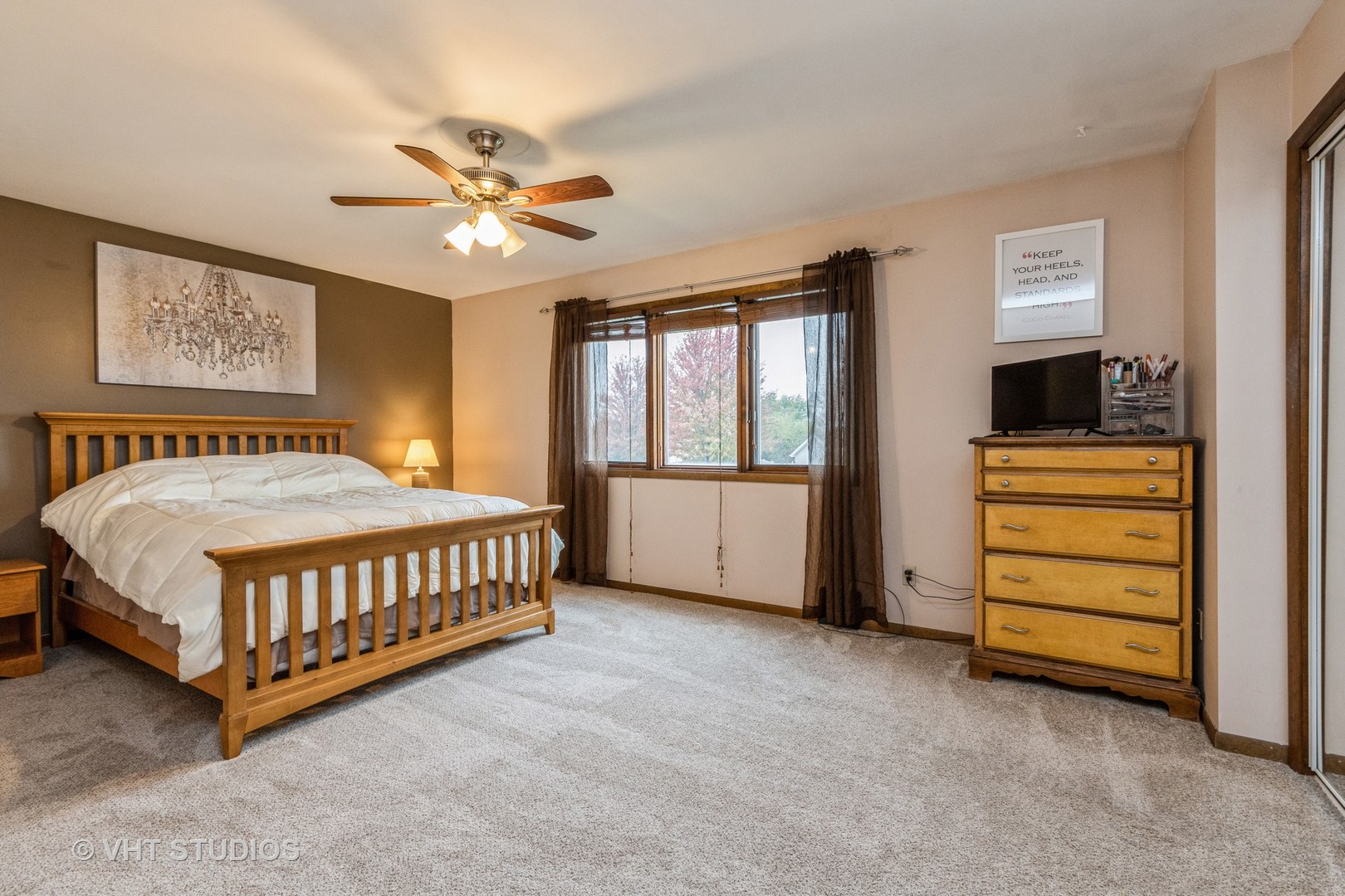 718 Sojourn Road New Lenox, IL 60451 - Photo 8 of 16 a bedroom with a bed and a ceiling fan