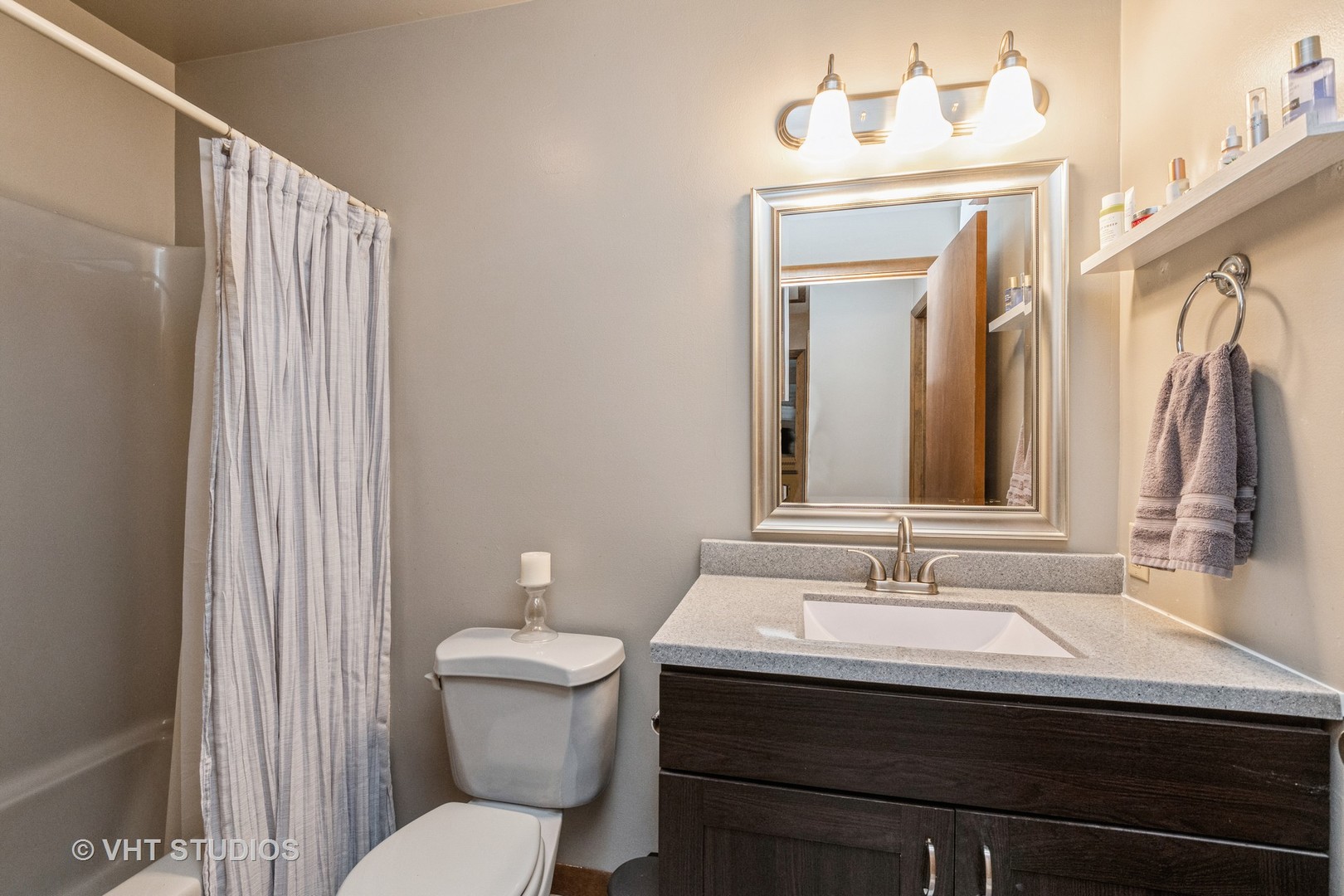 718 Sojourn Road New Lenox, IL 60451 - Photo 10 of 16 a bathroom with a sink a toilet and a mirror