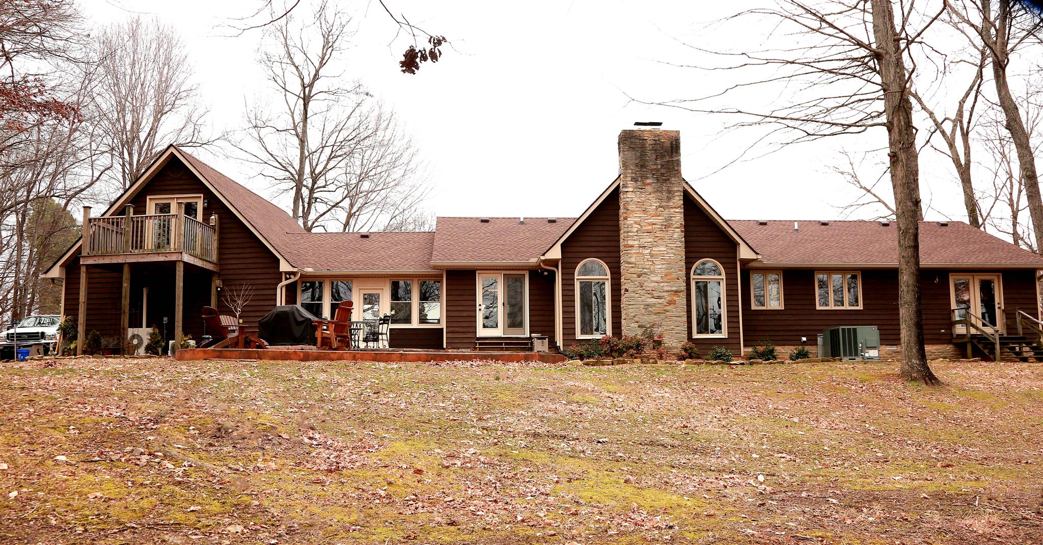 2004 Lawrence Lane Springfield, TN 37172 - Photo 21 of 30 a front view of a house with a yard covered with snow
