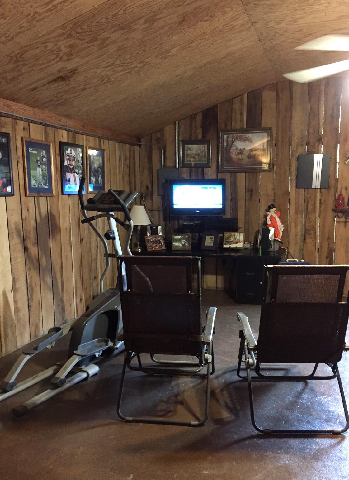 2004 Lawrence Lane Springfield, TN 37172 - Photo 24 of 30 a room with gym equipment and a table